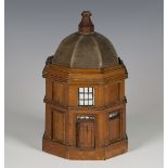 An early 20th century walnut novelty tea caddy, modelled in the form of an octagonal domed building,