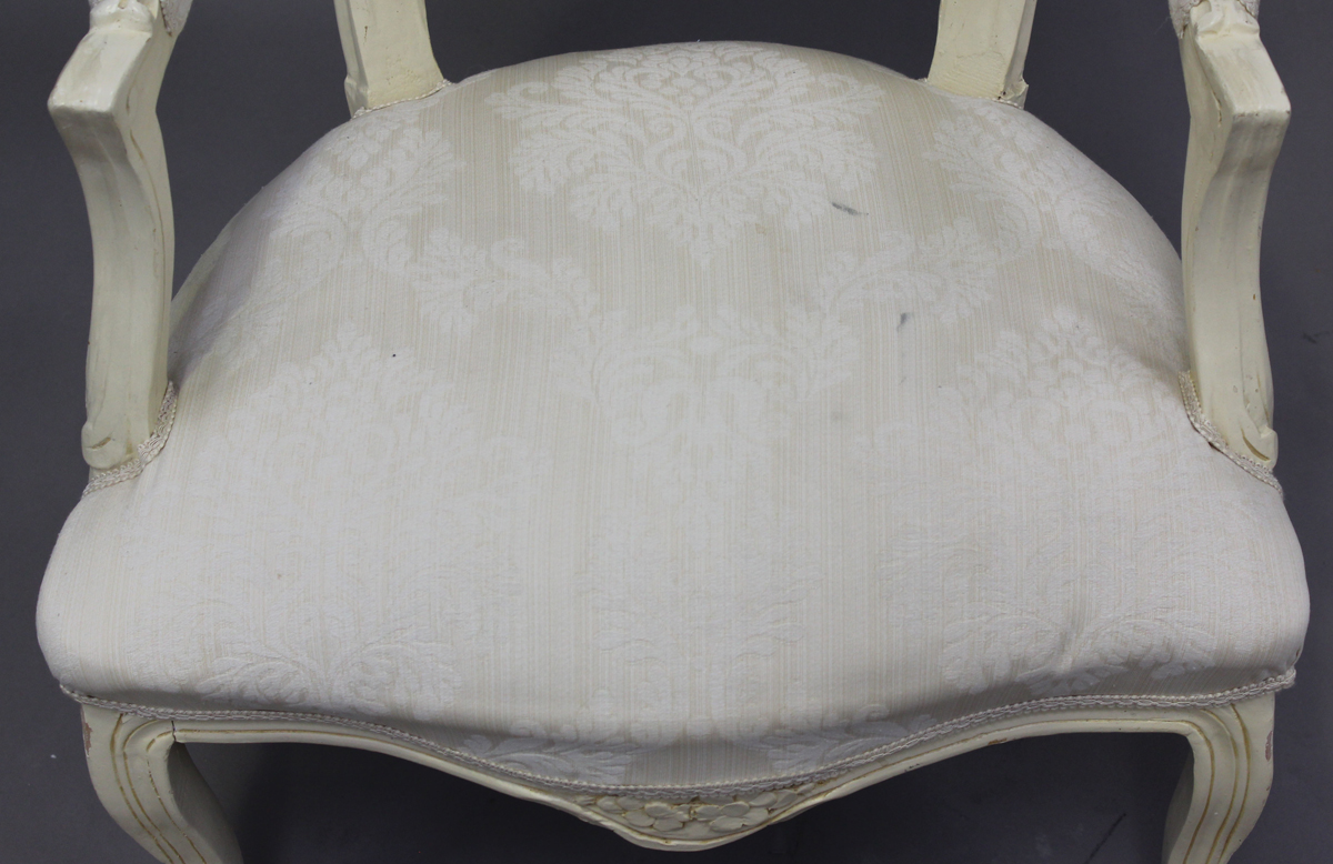 A pair of late 20th century French cream painted showframe fauteuil armchairs, height 91cm, width - Image 4 of 11