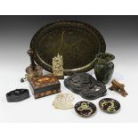A group of Middle and Far Eastern collectors' items, including a Chinese black inkstone, modelled