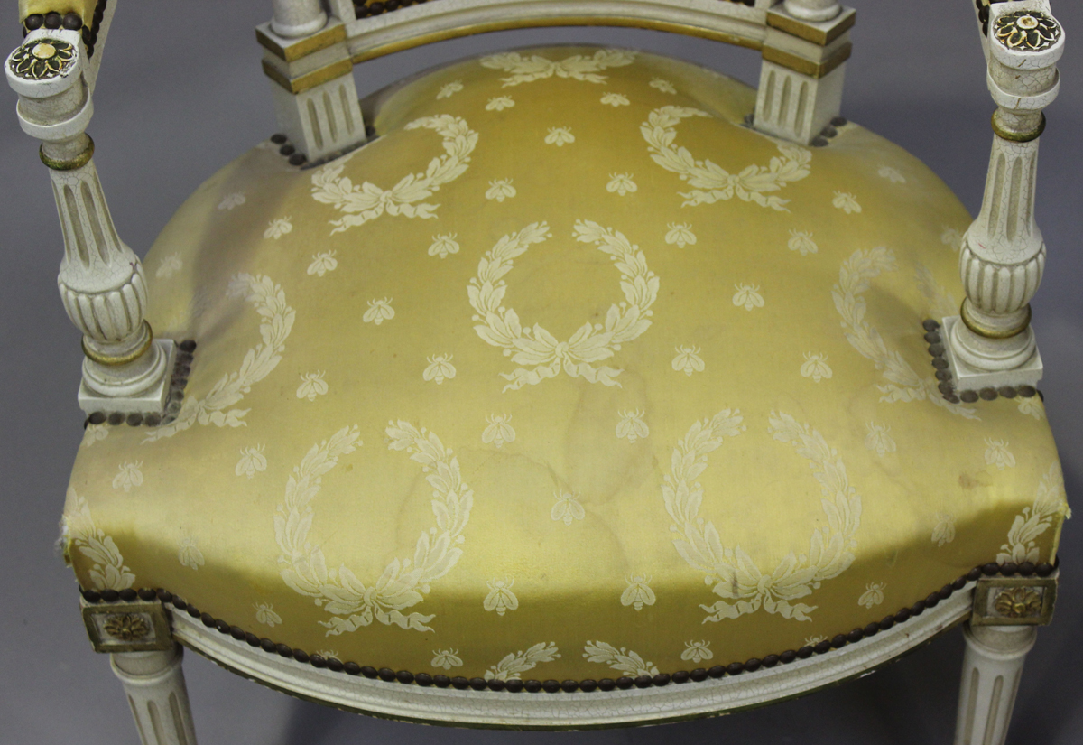 A pair of 20th century Louis XVI style white painted and gilt fauteuil armchairs, upholstered in - Image 11 of 12