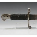 An 1887 pattern Martini Henry sword bayonet, blade length 46.5cm, with chequered leather grips.