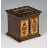 A Victorian Tunbridge ware table-top needlework cabinet, the hinged lid with a mosaic scene of a