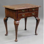 A Queen Anne walnut lowboy with crossbanded borders and boxwood stringing, fitted with two short and