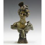 After Emanuel Villanis - 'Carmen', a green patinated cast bronze head and shoulders portrait bust,