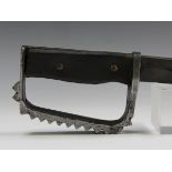 A First World War period knuckleduster trench knife with clipped-point fullered blade, blade