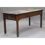 A 19th century provincial oak farmhouse table, each end fitted with a drawer, one end with a