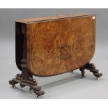 A good mid-Victorian burr walnut Sutherland table, raised on fluted and beaded supports with