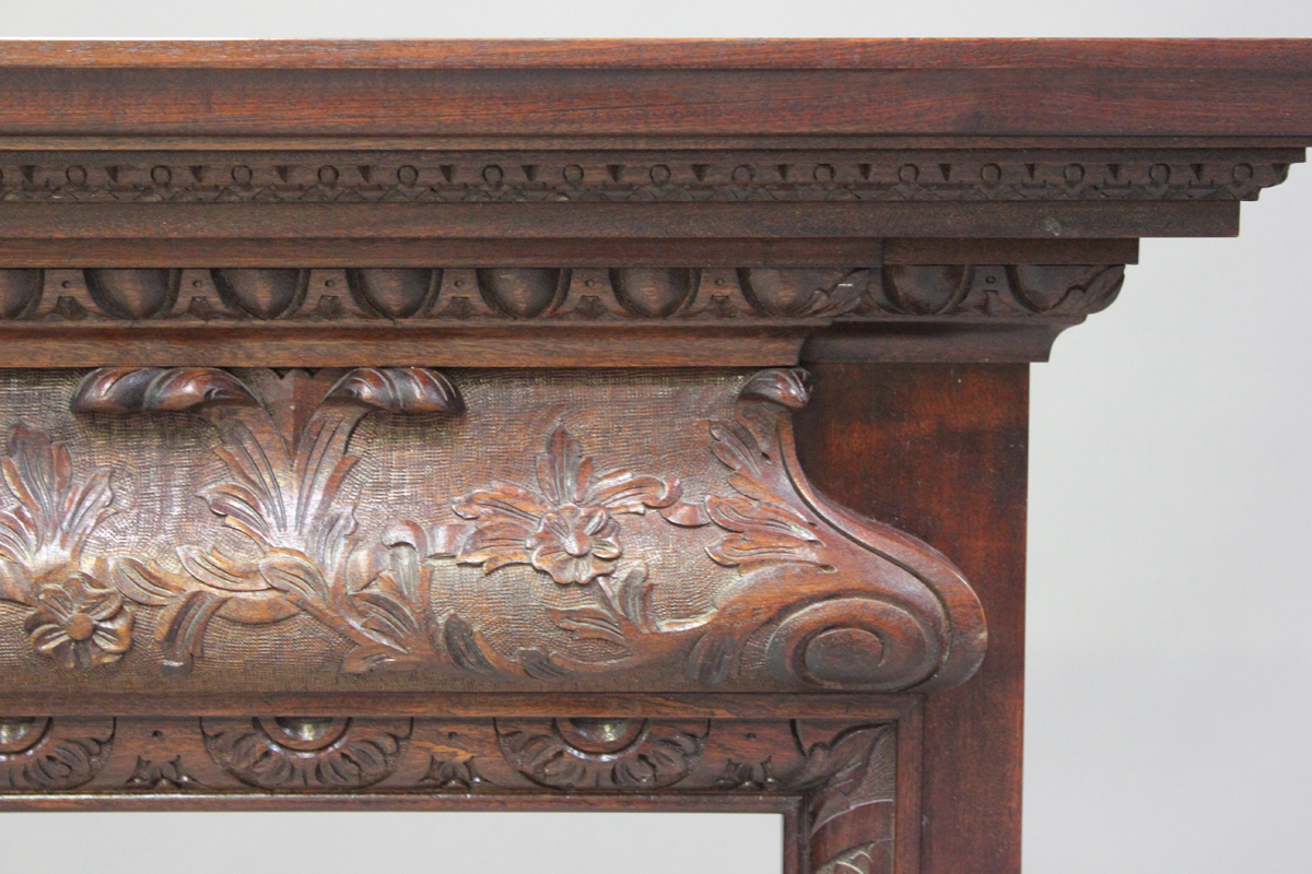 A modern reproduction mahogany fire surround with finely carved decoration, height 120cm, width - Image 5 of 5