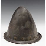 A 17th century style morion helmet with raised crown and narrow downturned brim with rolled edge,