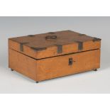 A 19th century bird's eye maple and iron bound needlework box, the hinged lid enclosing a