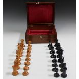 An early 20th century ebony and boxwood Staunton chess set, possibly by Jaques, the rooks and