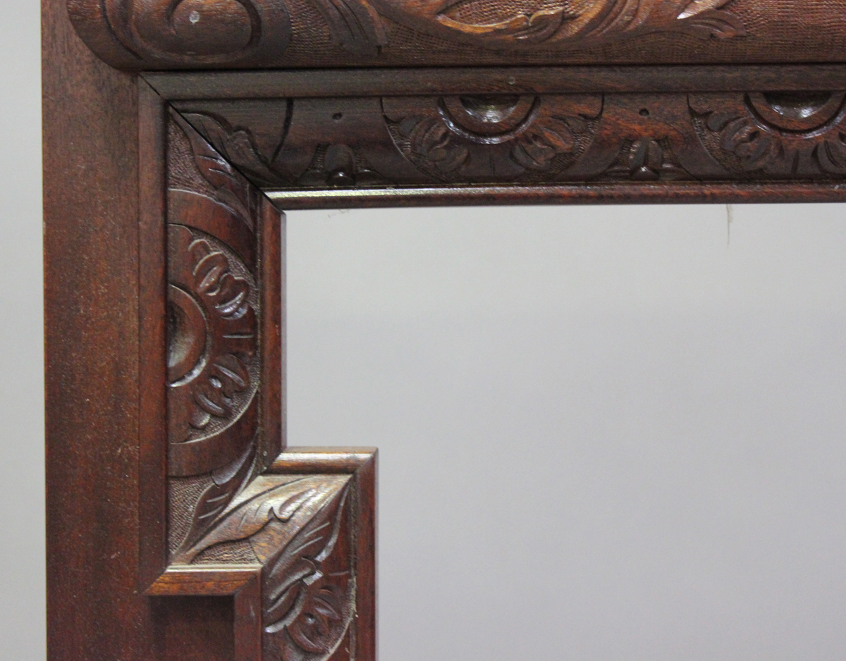A modern reproduction mahogany fire surround with finely carved decoration, height 120cm, width - Image 4 of 5