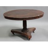 A Regency rosewood circular tip-top breakfast table, the crossbanded top above a turned stem and