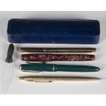 A 'Swan Pen' Mabie Todd & Co New York 9ct gold cased fountain pen, import mark London 1920, with a