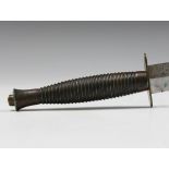 A third pattern Fairbairn-Sykes fighting knife with straight double-edged blade, blade length 17.