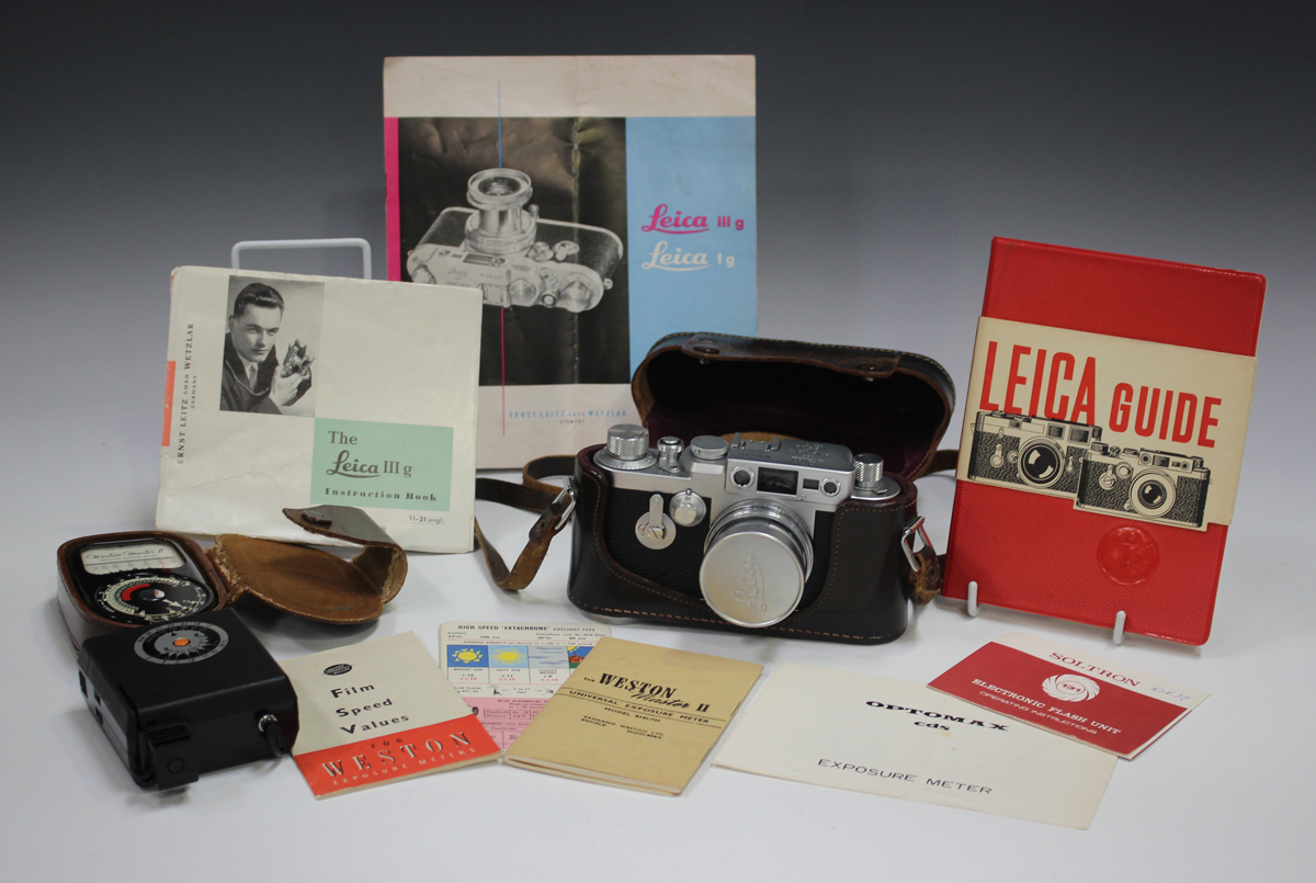 A Leica IIIg camera, No. 934525, circa 1958, with Leitz Summicron f=5cm 1:2 lens, No. 1478776,