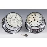 A 20th century chromium plated brass ship's style wall clock and matching barometer, the clock