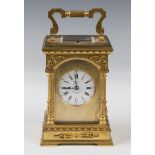 A late 19th/early 20th century French lacquered brass carriage clock by Margaine of Paris, with
