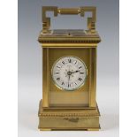 A late 19th century French matt gilt brass carriage clock by Drocourt, with eight day movement