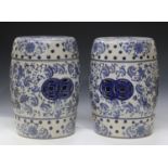 A pair of modern Chinese blue and white porcelain garden seats of barrel form, height 43cm.Buyer’s