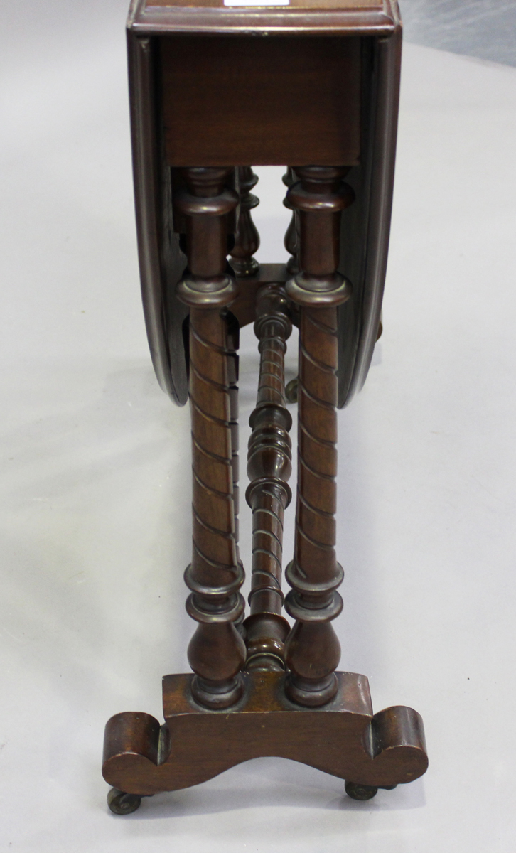 A late Victorian walnut oval Sutherland table, on spiral fluted legs and brass castors, height 73cm, - Image 4 of 4