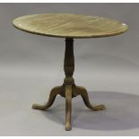 A George III mahogany tip-top circular wine table, on tripod cabriole legs, height 71cm, diameter