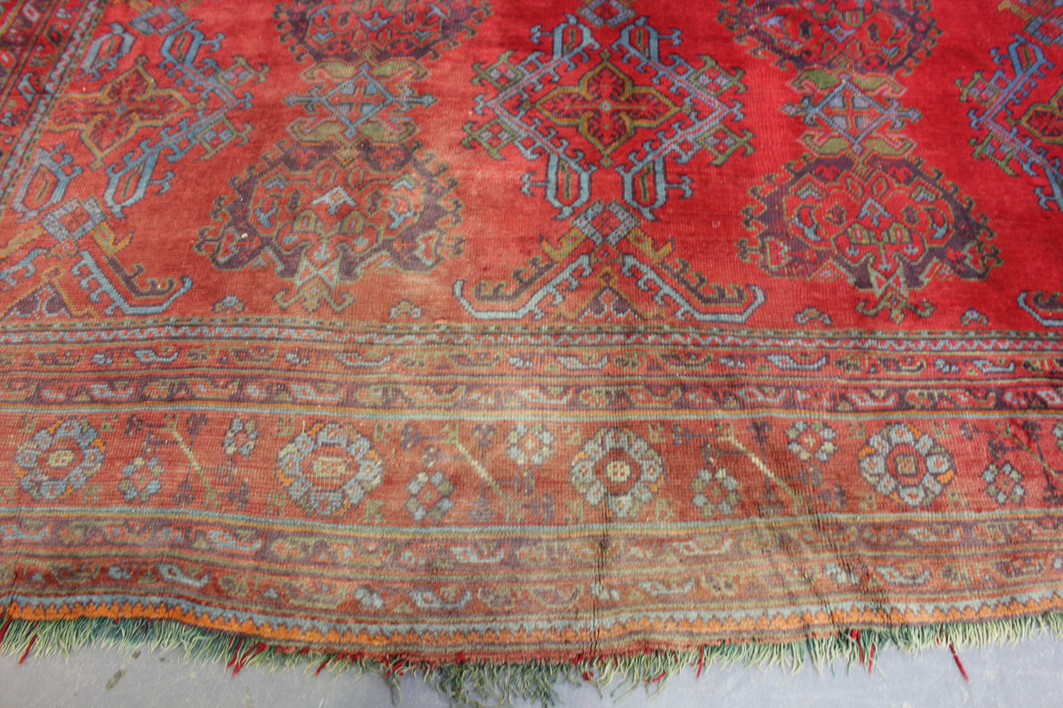 A large Turkish 'Old Turkey' carpet, early 20th century, the red field with overall palmettes and - Image 3 of 11