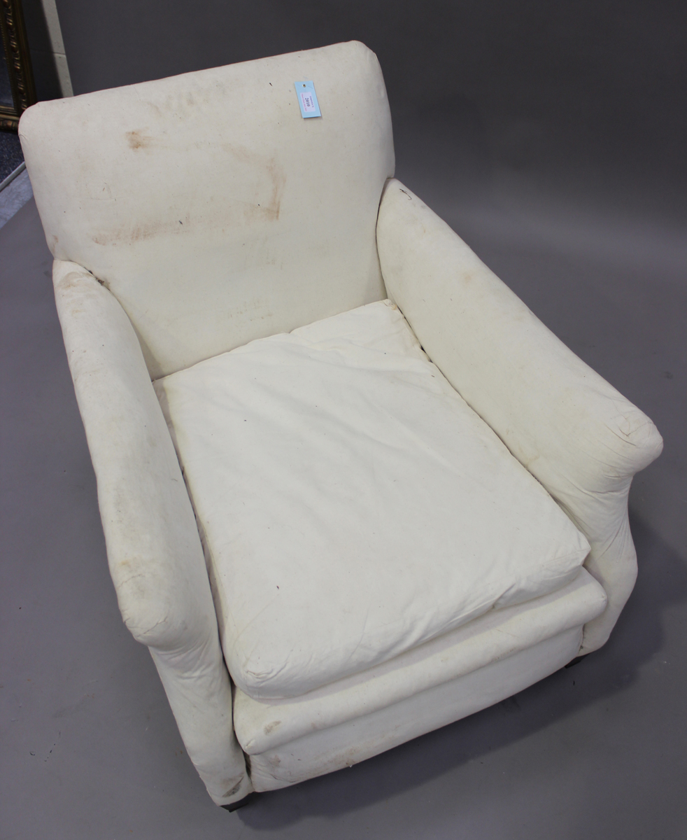 An Edwardian scroll armchair, in the manner of Howard & Sons, raised on square tapering legs, height - Image 4 of 5