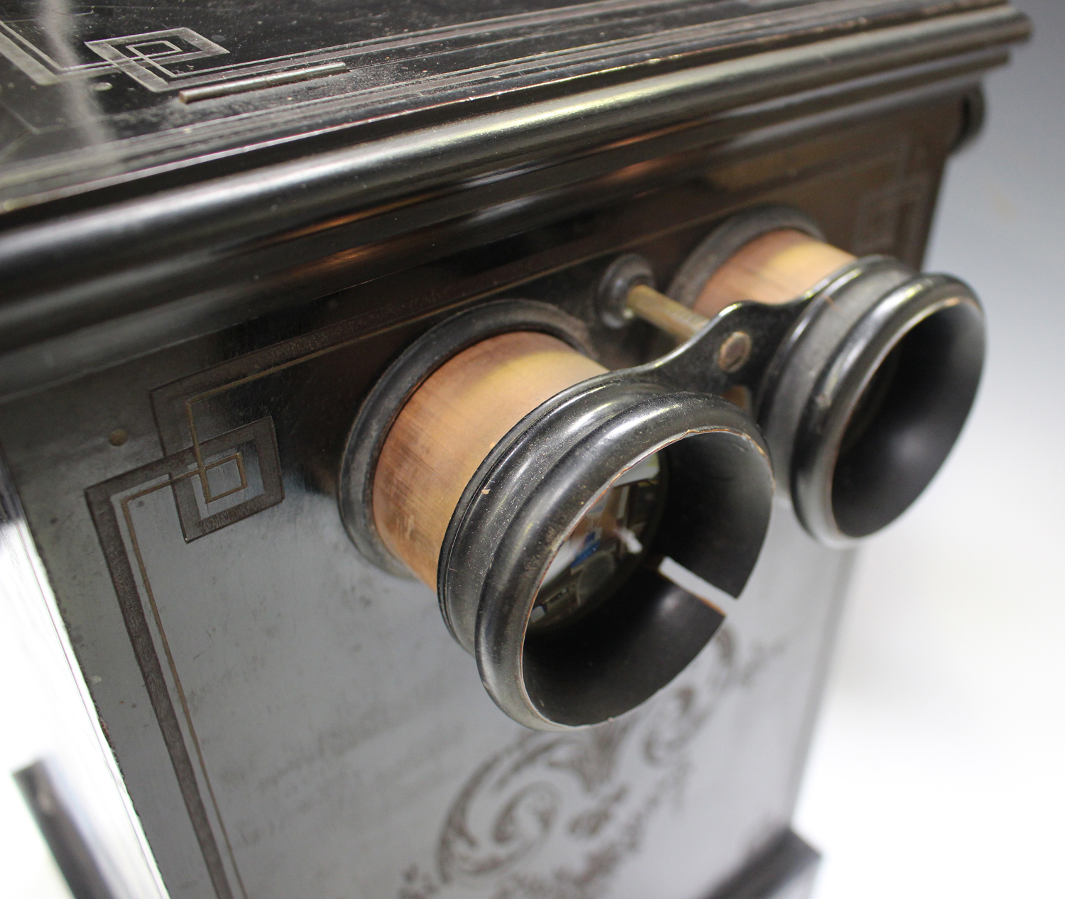 A late Victorian Aesthetic Movement ebonized stereoscopic viewer, containing a collection of mixed - Image 12 of 12