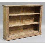 An early 20th century ash open bookcase with adjustable shelves, height 101cm, width 129cm, depth