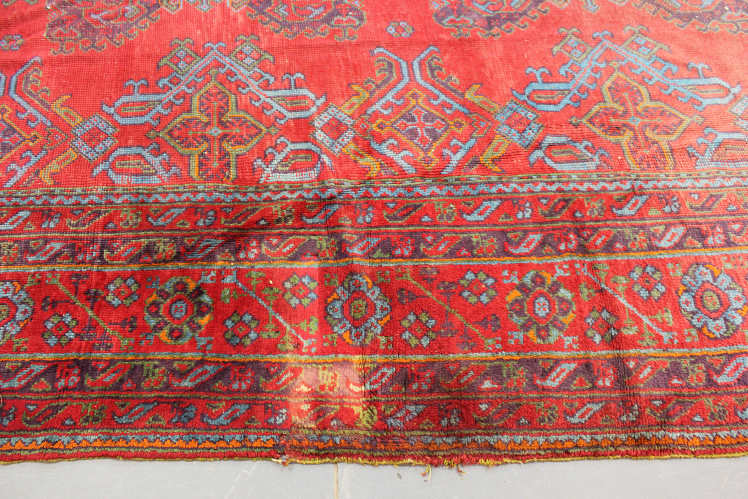 A large Turkish 'Old Turkey' carpet, early 20th century, the red field with overall palmettes and - Image 5 of 11