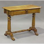 A late Victorian walnut side table, fitted with two frieze drawers, on turned supports, height 80cm,