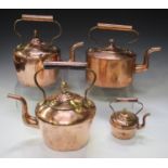 A group of four Victorian copper kettles, height of tallest 31cm.Buyer’s Premium 29.4% (including