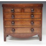 An early Victorian mahogany table-top apprentice chest of drawers, height 26cm, width 27cm.Buyer’s
