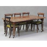 A late Victorian mahogany extending dining table with single extra leaf, on turned legs and castors,