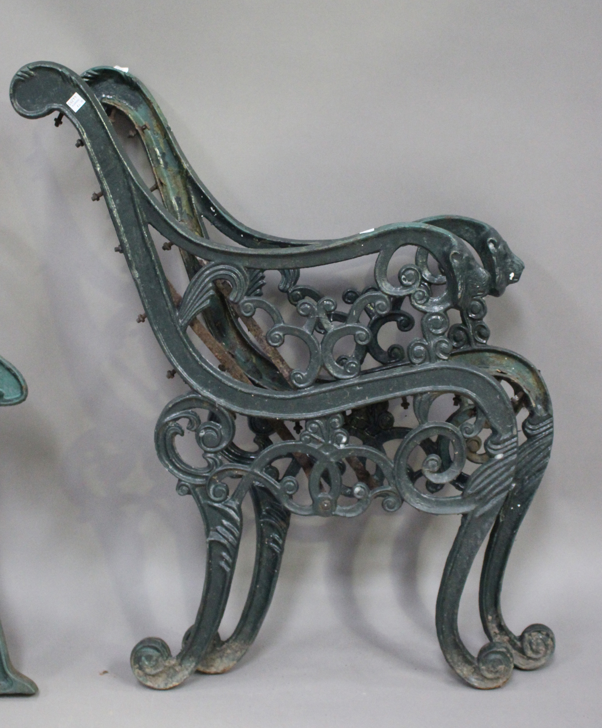 A pair of early 20th century green painted cast iron bench ends of scroll form, height 83cm, depth - Image 3 of 3