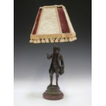 An early 20th century French cast spelter figural table lamp, modelled after Emile Bruchon as the