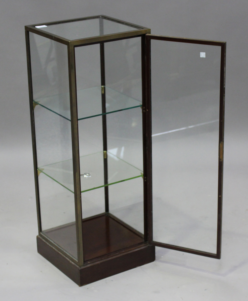 A mid-20th century brass framed display case with lockable hinged door, two glass shelves and - Image 2 of 4