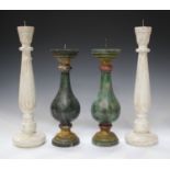 A pair of Indian green painted and turned wooden pricket candlesticks, height 36.5cm, together