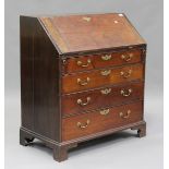 A George III mahogany bureau, the fall-front above four long drawers, on bracket feet, height 101cm,