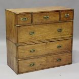 A late 19th century mahogany and brass bound campaign chest of three short and three long drawers,