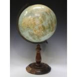 An early/mid-20th century '12 inch Bacon's Excelsior' table globe, raised on a turned walnut