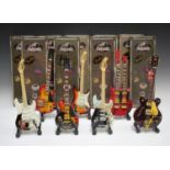 A group of eight modern miniature replica models of celebrity guitars by 'The Baby Axe Co Ltd',