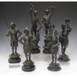 A pair of late 19th century black painted cast spelter figures of South American tribes people,