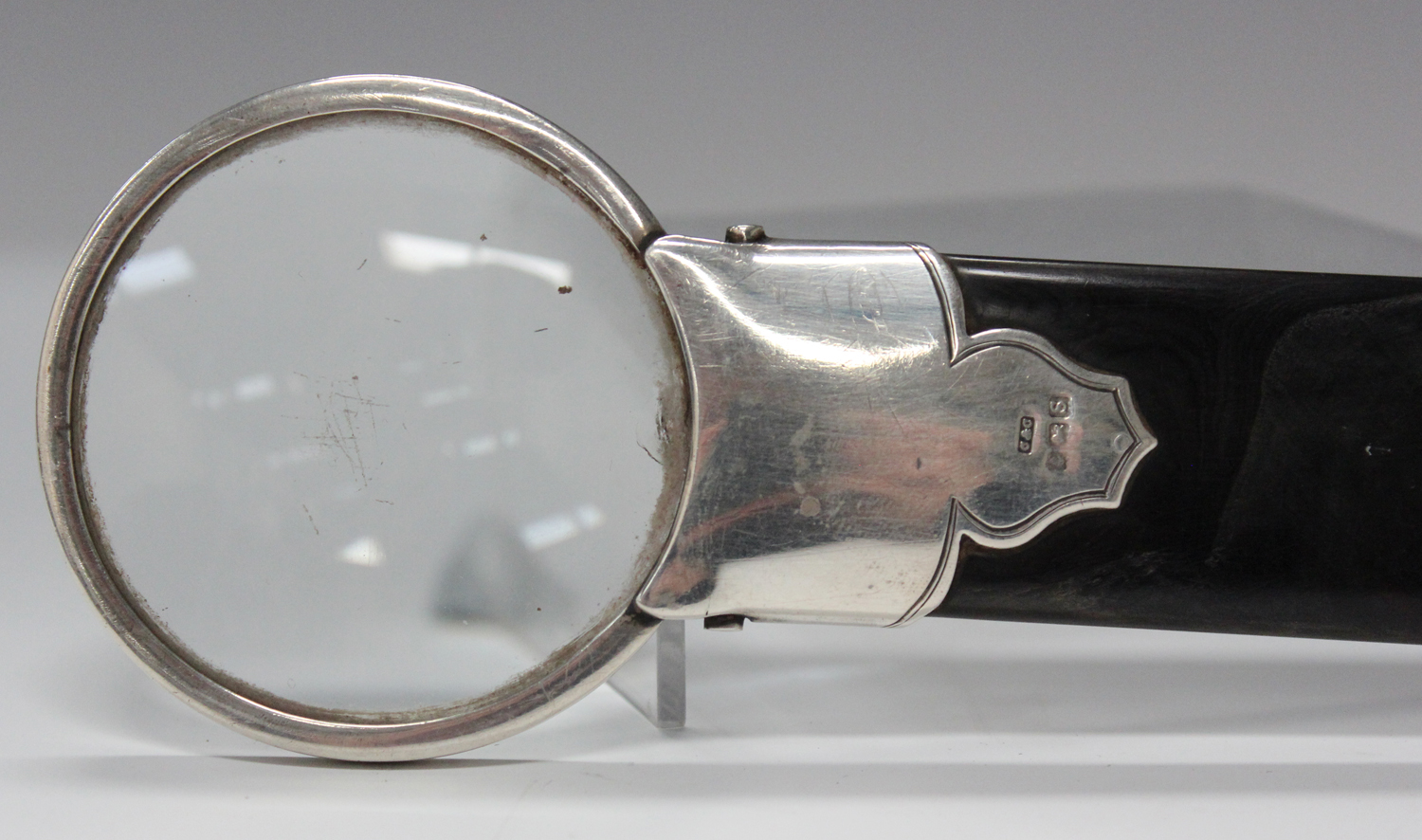 An early 20th century tortoiseshell and silver mounted page turner with magnifying lens terminal, - Image 3 of 5