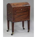 A George III Sheraton period figured mahogany wine cellaret with dome hinged top, on reeded block