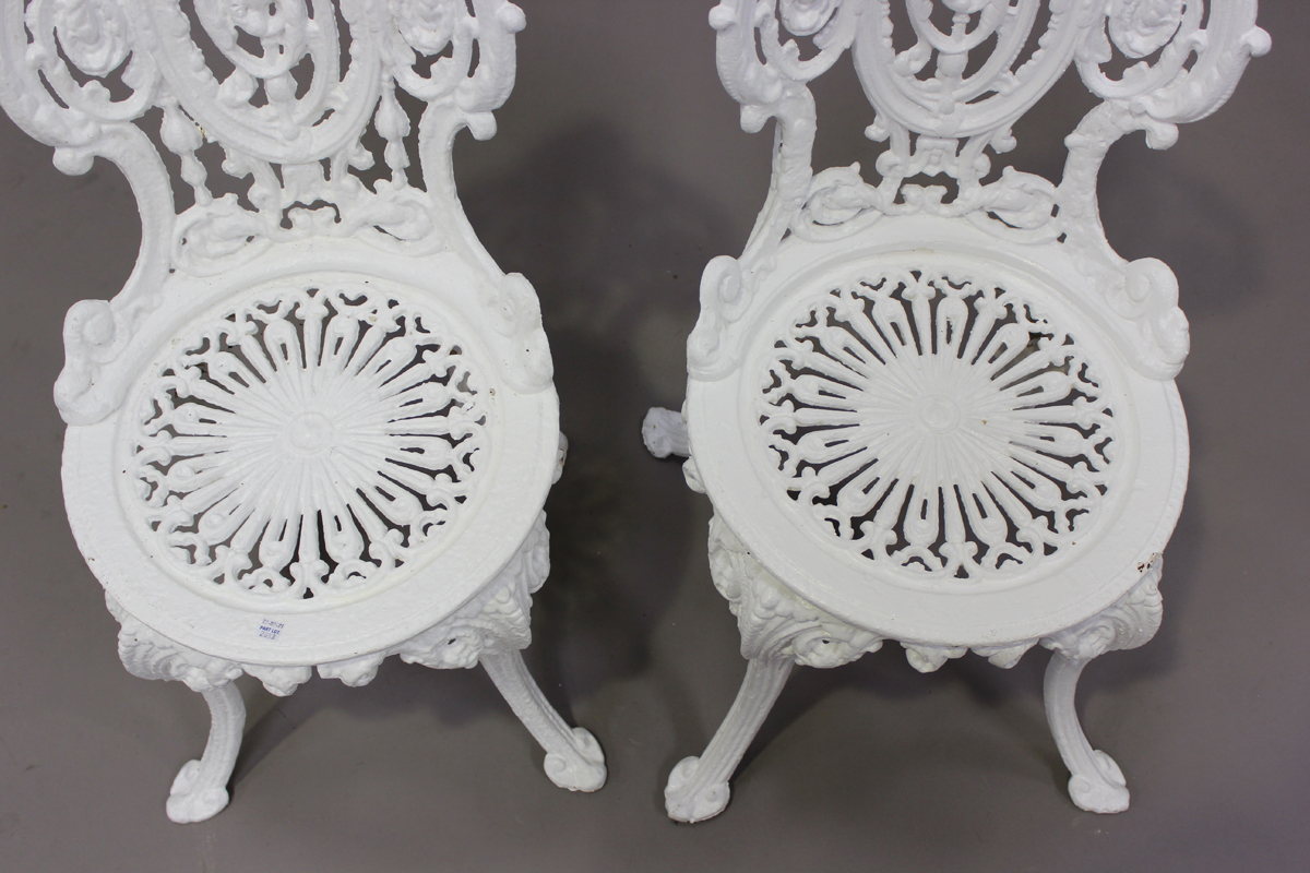 A pair of late Victorian white painted cast iron garden chairs of foliate scroll form, height - Image 3 of 4