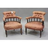 A pair of late Victorian walnut framed tub back salon armchairs, height 73cm, width 60cm, depth
