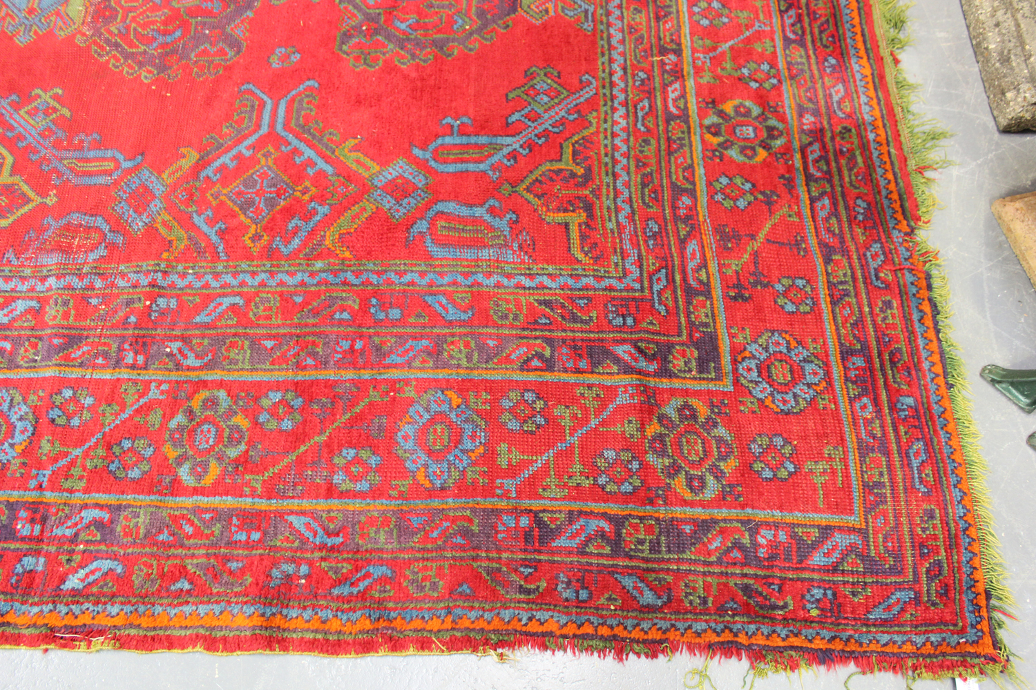 A large Turkish 'Old Turkey' carpet, early 20th century, the red field with overall palmettes and - Image 8 of 11