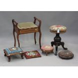 A late Victorian oak circular revolving piano stool with tapestry seat, height 52cm, diameter